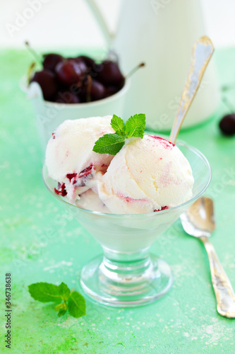 Homemade ice cream with cherry and amaretto.
