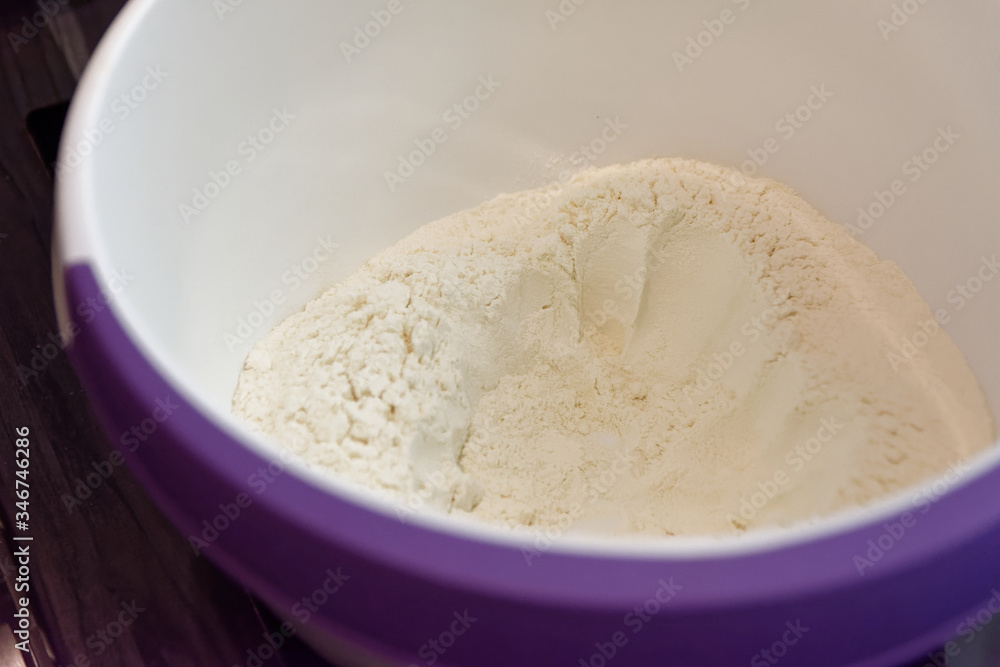 a bowl of flour in closeup