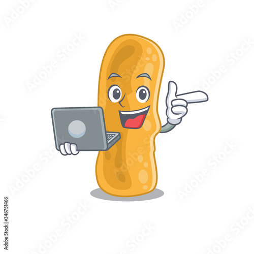 Cartoon character of shigella flexneri clever student studying with a laptop photo