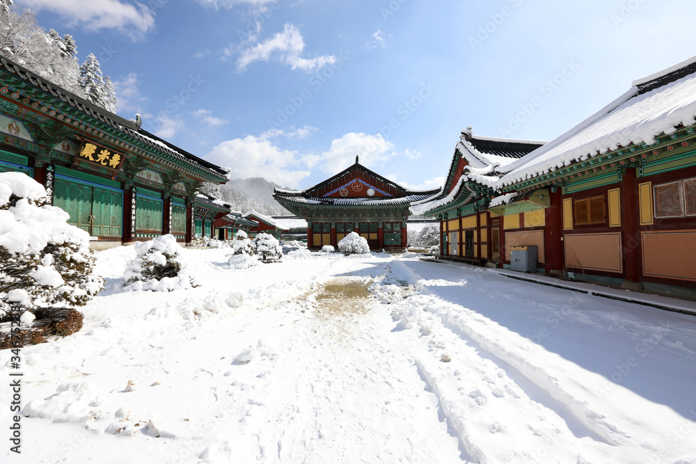 Woljeongsa, a buddhist temple, covered with snow, Gangwon-do, Korea. Soogwangjeon, Translation of chinese Text