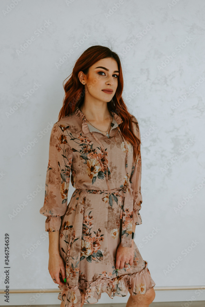 Girl in color summer dress on the white background Girl in color summer dress on the white background