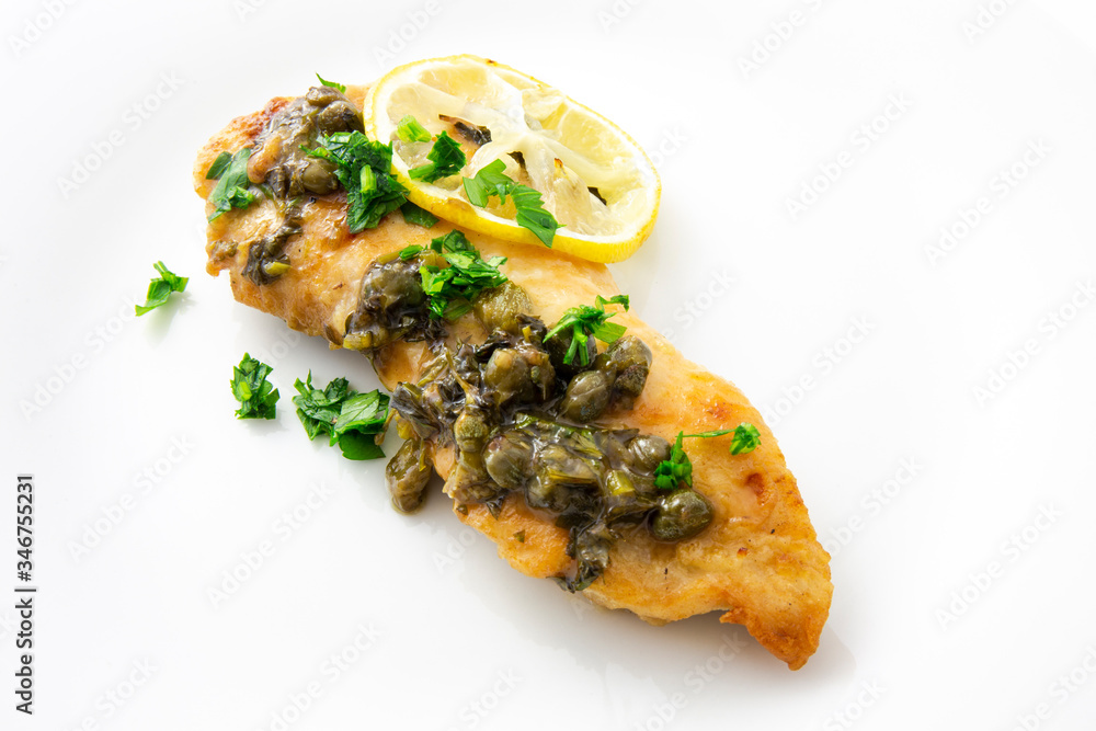 Chicken piccata with sauce, lemon and capers Chicken piccata with sauce, lemon and capers