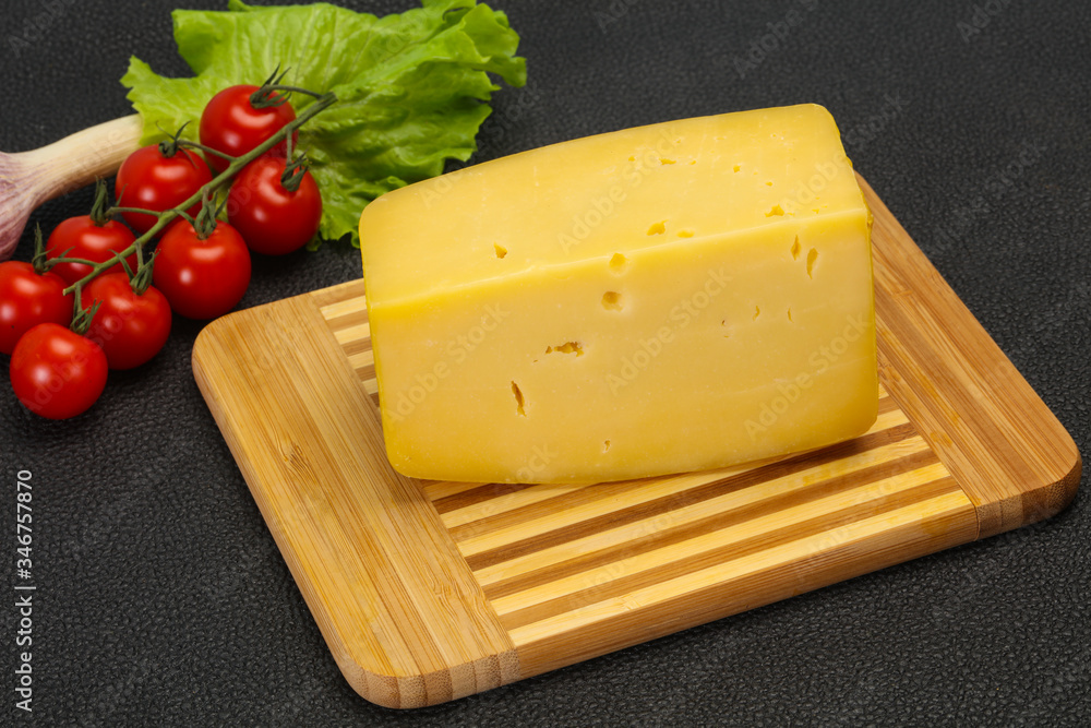 Hard yellow tasty cheese brick Hard yellow tasty cheese brick