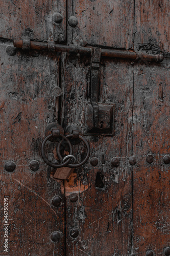 typical old wooden door in the medina of Fes. It also uses an old locker!!