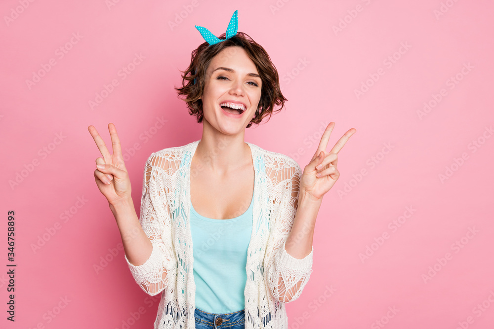 Portrait of her she nice-looking attractive lovely pretty positive cheerful cheery glad girl showing double v-sign having fun isolated over pink pastel color background