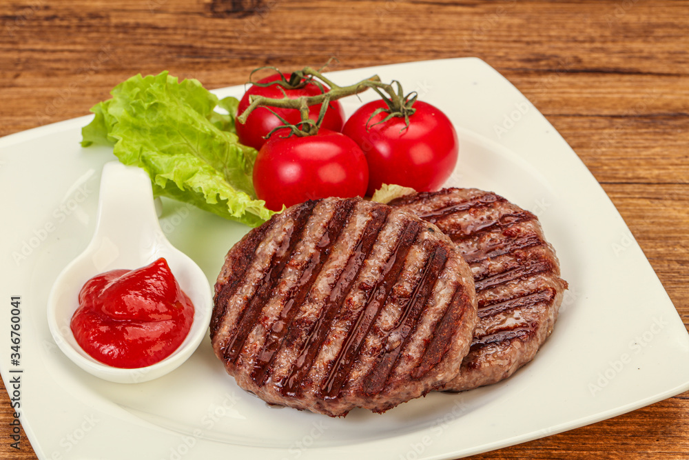 Grilled burger cutlet with sauce Grilled burger cutlet with sauce