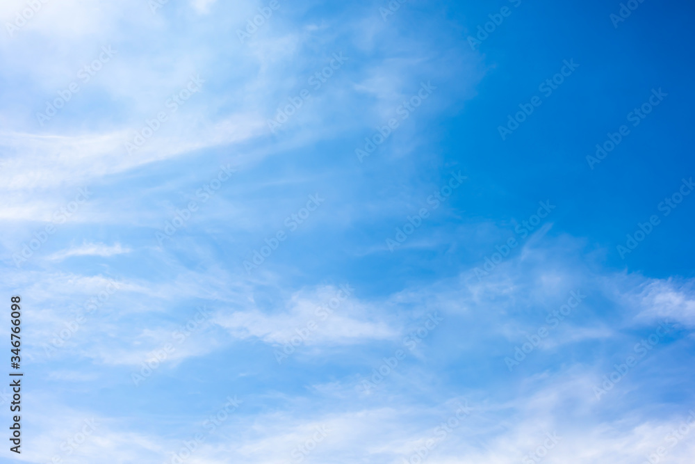 Beautiful blue summer sky with clouds as a background Beautiful blue summer sky with clouds as a background