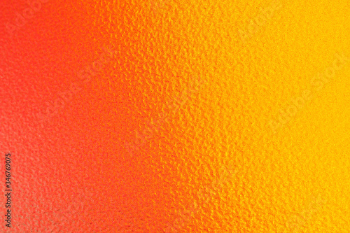 The background is orange shading to a deep yellow