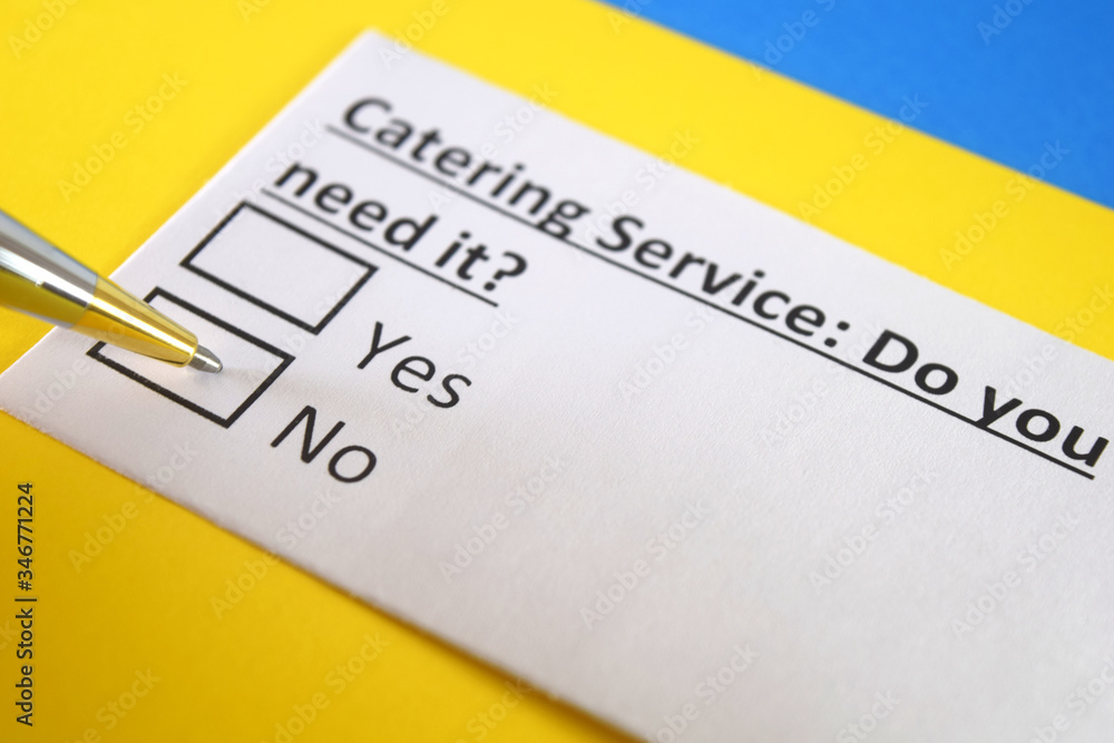 One person is answering question about catering service. One person is answering question about catering service.