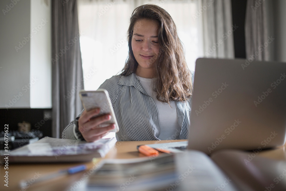 Girl studying and working at home Girl studying and working at home