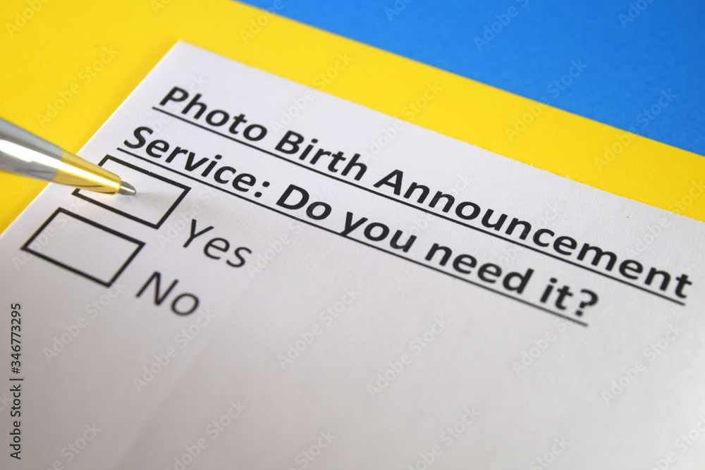 One person is answering question about photo birth announcement service. One person is answering question about photo birth announcement service.
