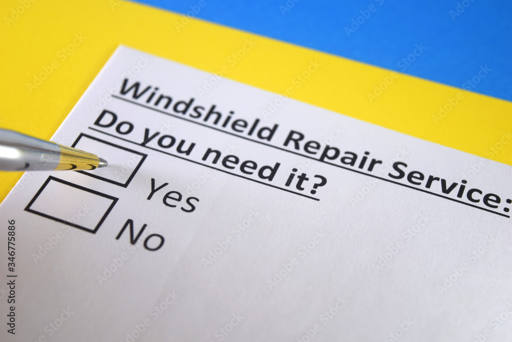 One person is answering question about windshield repair service. One person is answering question about windshield repair service.