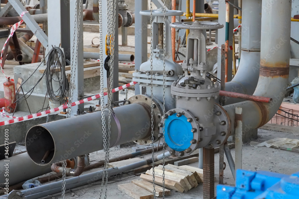 Manual arc welding of Du200 steel pipelines and their installation for connecting industrial pumps pumping oil and gasoline. Manual arc welding of Du200 steel pipelines and their installation for connecting industrial pumps pumping oil and gasoline.