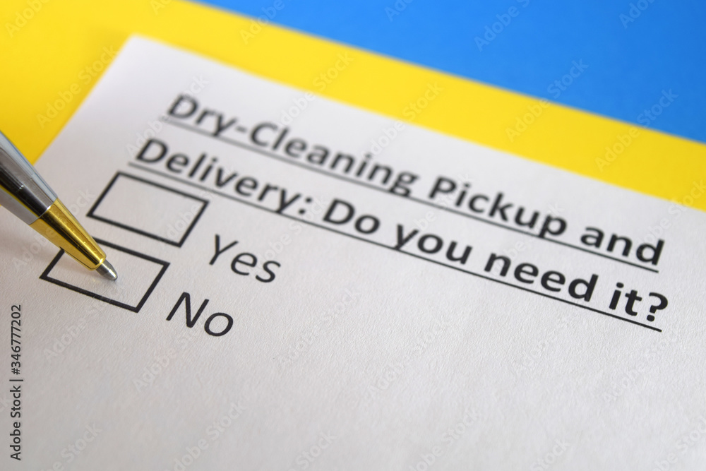 One person is answering question about dry cleaning pickup and delivery. One person is answering question about dry cleaning pickup and delivery.