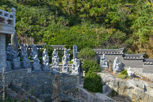 Busan city, South Korea - NOV 01, 2019: Lucky coin divination inside Haedong Yonggung Temple grounds.
 photo