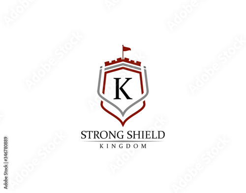 Strong Shield, Gold Heraldic K Letter Monogram. Retro minimal shield Shape.  Crown, Castle, Kingdom Logo Design.