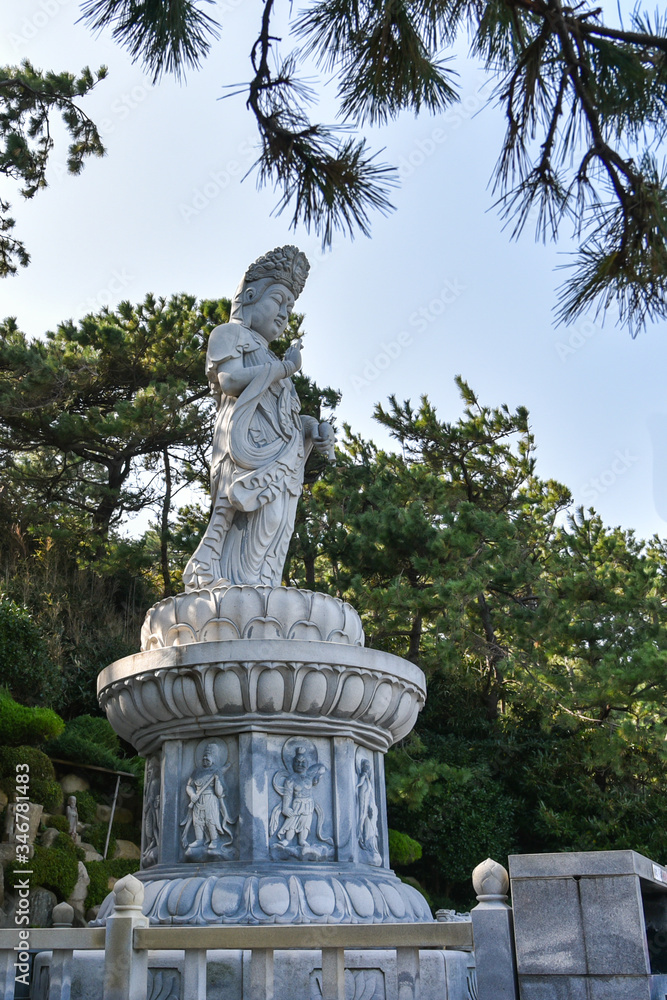 Carved stone statues in Guanyin figures at Haedong Yonggung Temple in Busan , South Korea