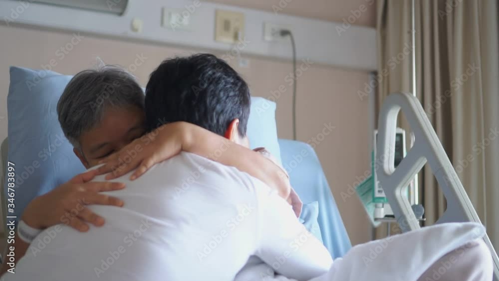Couple women hold hands lover that sick lying in Hospital bed for sleeping with love emotional, Encouragement comforting Recovering from family healthy Moment, Hopeful emotional LGBT concept Couple women hold hands lover that sick lying in Hospital bed for sleeping with love emotional, Encouragement comforting Recovering from family healthy Moment, Hopeful emotional LGBT concept