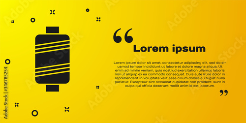 Black Sewing thread on spool icon isolated on yellow background. Yarn spool. Thread bobbin. Vector Illustration