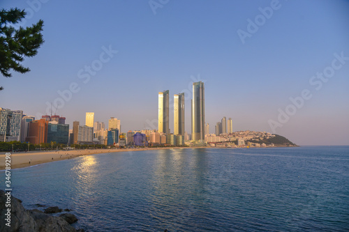 Busan city, South Korea - NOV 02, 2019: People relaxing and having fun on Haeundae Beach.One of the famous beautiful attractions in Busan.