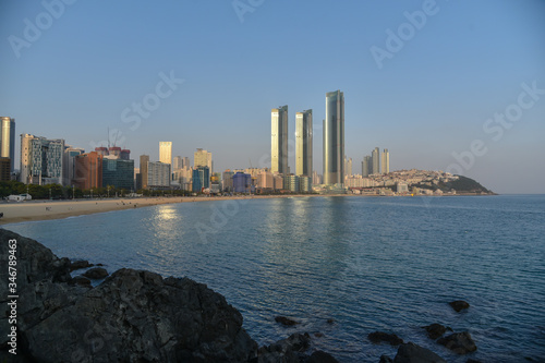 Busan city, South Korea - NOV 02, 2019: People relaxing and having fun on Haeundae Beach.One of the famous beautiful attractions in Busan.