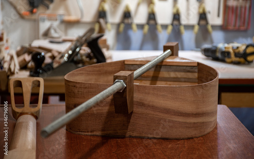 body of mediterranean flat lavta musical instrument on the workbench photo