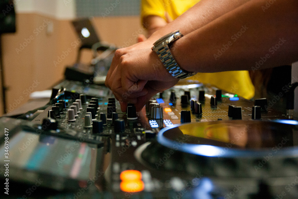 View of the illuminated controls on an equaliser on a music deck used by a disc jockey to learn dj View of the illuminated controls on an equaliser on a music deck used by a disc jockey to learn dj