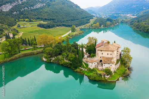 Calavino, Italy. Toblino castle on a beautiful lake. photo