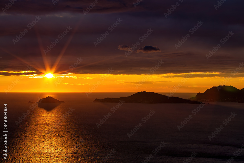Sunset golden hour on the island of Tino in the Gulf of La Spezia Italy, from Montemarcello Sunset golden hour on the island of Tino in the Gulf of La Spezia Italy, from Montemarcello