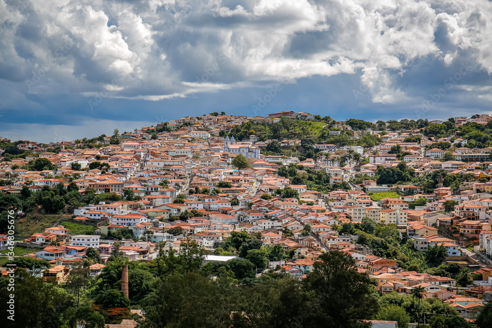 Aerial view with sunshine over the historic town and dramatic sky, Diamantina, Minas Gerais, Brazil