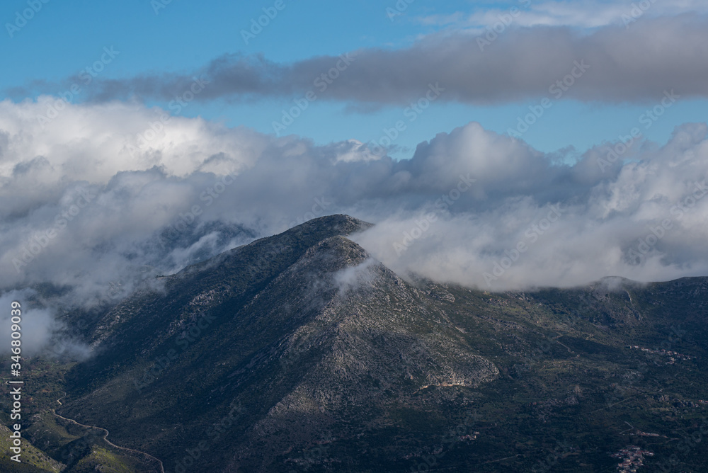 Cloudy foggy mountains landscape view of Exo Mani near Areopoli, Peleponnes, Greece