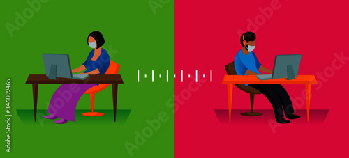 Man and woman practicing soocial distancing in the workplace to defeat Covid-19