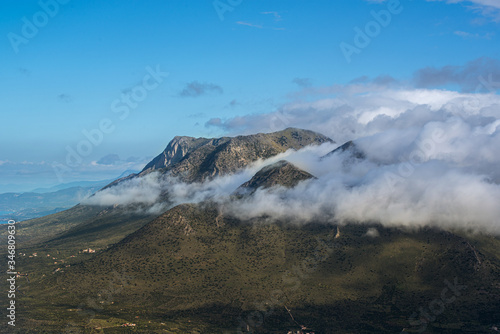 Cloudy foggy mountains landscape view of Exo Mani near Areopoli, Peleponnes, Greece photo