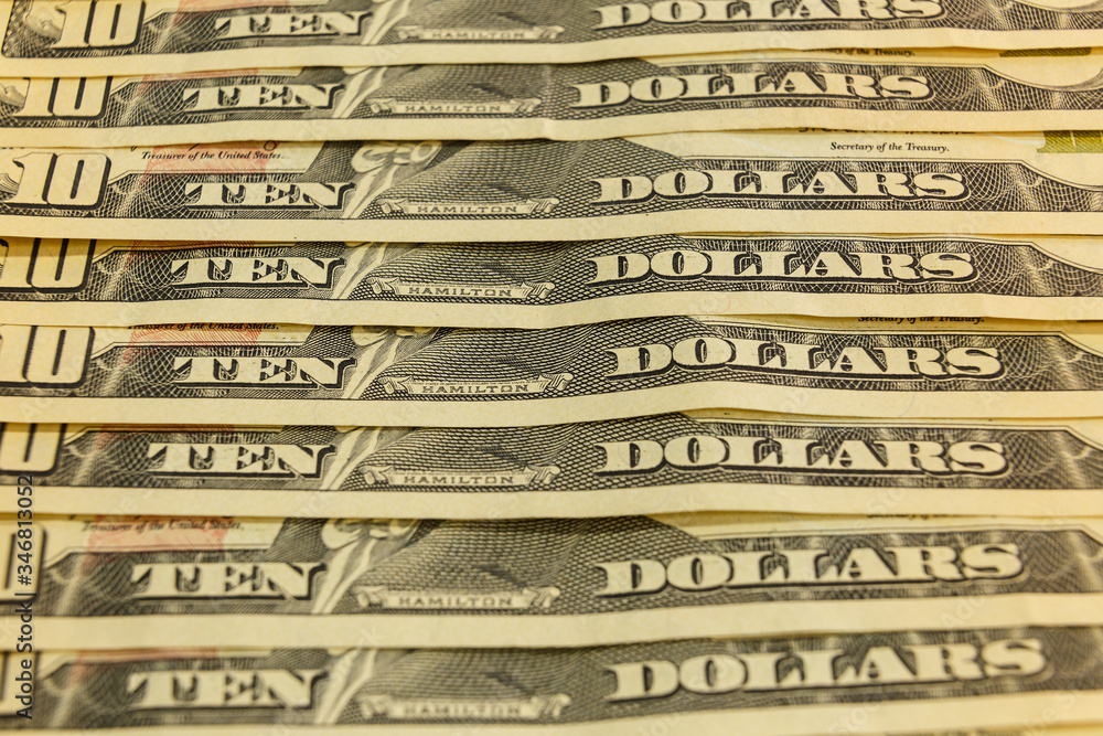 ten us dollars, background from paper money. ten us dollars, background from paper money.