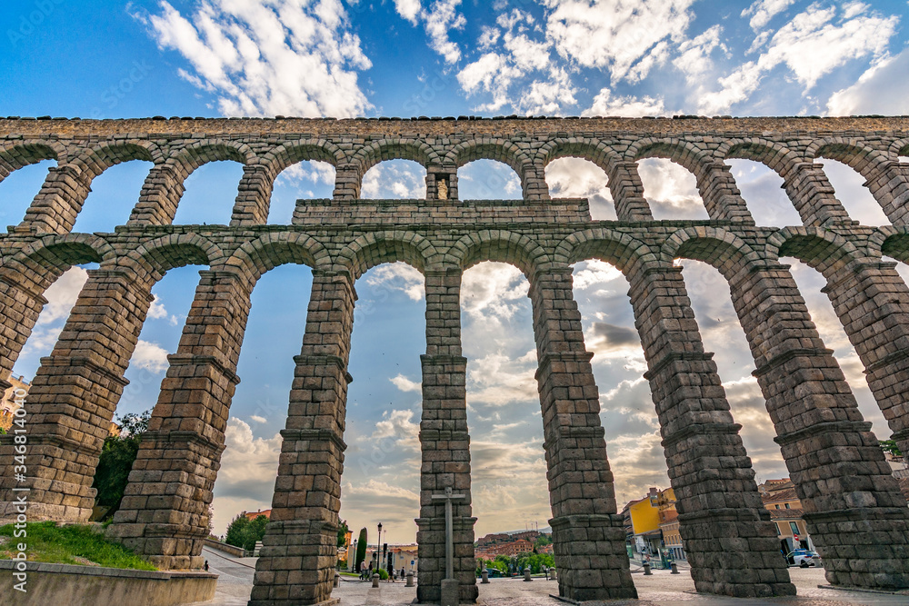 The famous Roman aqueduct of Segovia in Spain. Heritage of humanity by unesco. The famous Roman aqueduct of Segovia in Spain. Heritage of humanity by unesco.