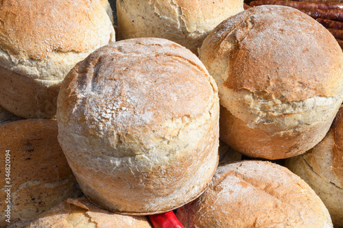 Homemade traditional buns of bread, authentic rustic recipe on counter top during food festival