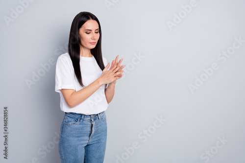 Portrait of serious girl want stop corona virus spreading follow hygiene wash her hands with antiseptic sanitizer soap wear good look outfit isolated over gray color background