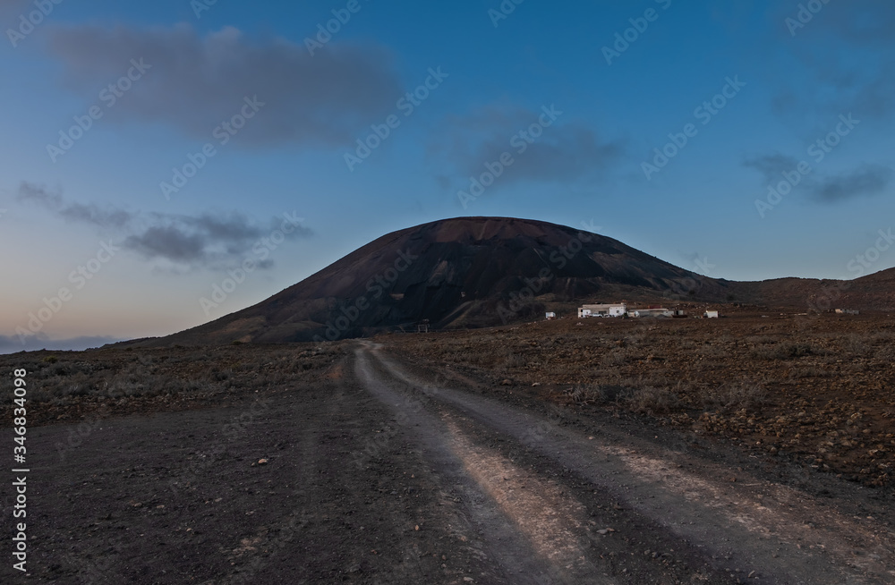 Landscape mountain fantasy at sunset in Calle Montana de la Arena, Fuerteventura, Canary islands, Spain. October 2019 Landscape mountain fantasy at sunset in Calle Montana de la Arena, Fuerteventura, Canary islands, Spain. October 2019