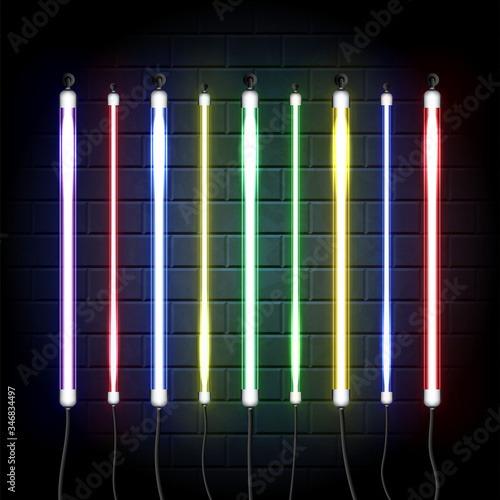 Collection of realistic led neon tube light pack on dark brick background
