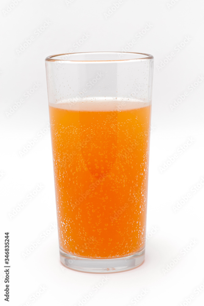 soluble effervescent multivitamin in a glass glass with water on a white background soluble effervescent multivitamin in a glass glass with water on a white background
