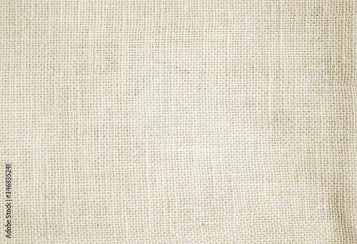 Light brown linen background Weaving Canvas Fabric Texture background. or Natural brown cloth surface .