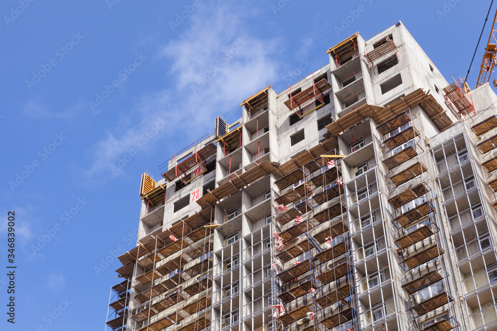Fototapeta premium Construction of a new skyscraper or apartment building