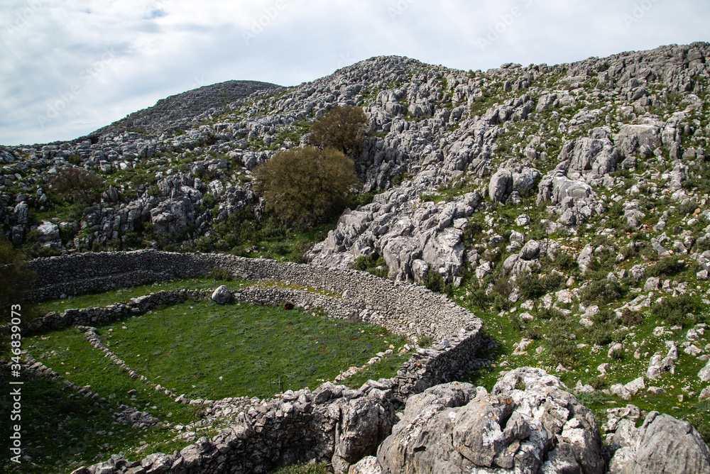Traditional sheep stone houses, archeological place at mountains near Mani near Areopoli, Peleponnes, Greece