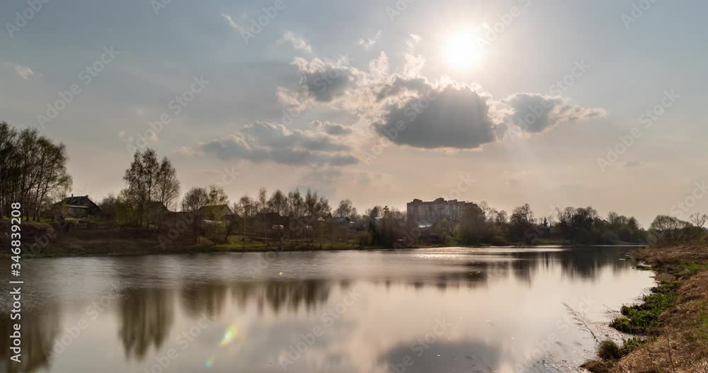 Clouds fly over the lake and the city Clouds fly over the lake and the city