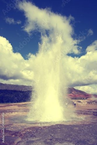 Iceland geyser erupting. Vintage filtered colors style.