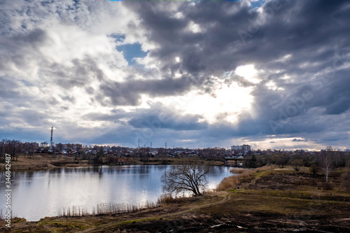 The Uvod River in the city of Ivanovo with a beautiful cloudy sky. © Valery Smirnov