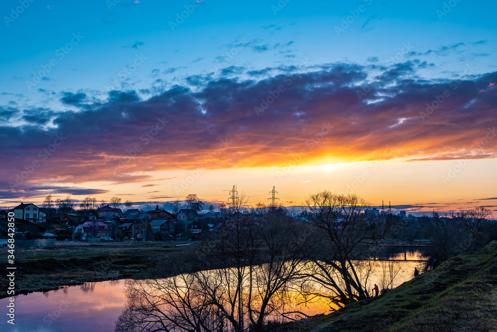 Bright orange sunset over the city of Ivanovo and the river Uvod.