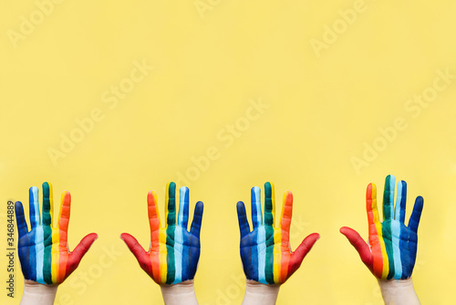 Hand painted as a rainbow flag. LGBTQ concept. Hand LGBT close up