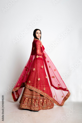 beautiful indian bride wearing traditional indian bridal dress