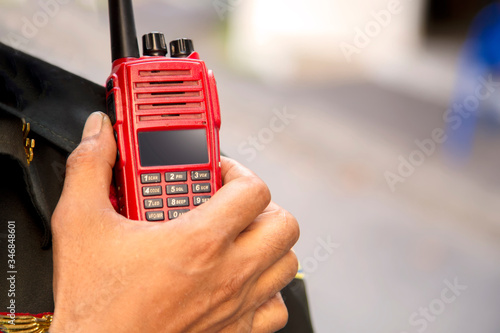 Tableau sur toile Close up of the Red radio on the shoulder of a security guard at the parking lot